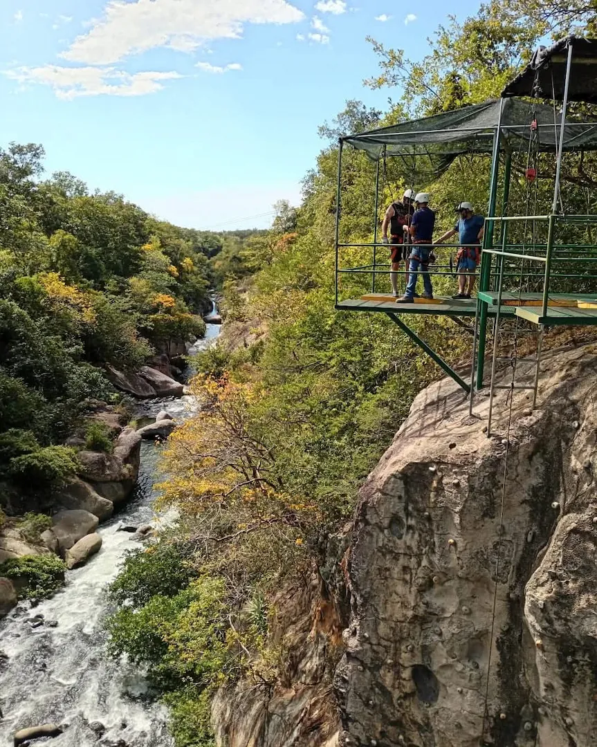 Rappel down canyon wall at Canyon Adventure Park, Costa Rica