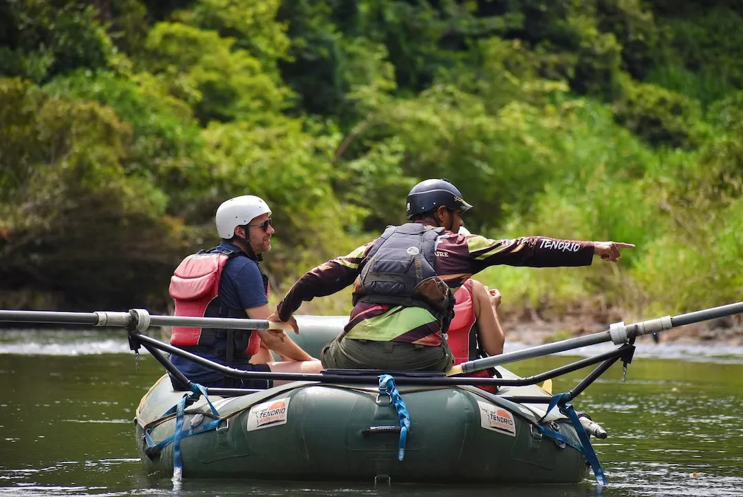 Giant kapok trees overhanging the Tenorio River during safari float